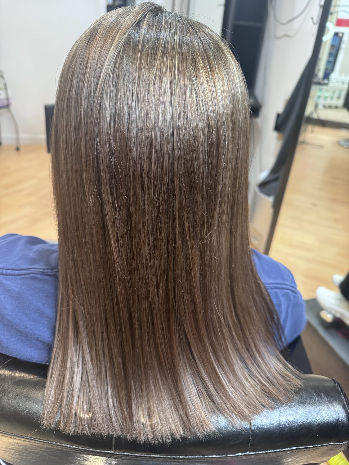 Glossy bronde blowout, straight and smooth